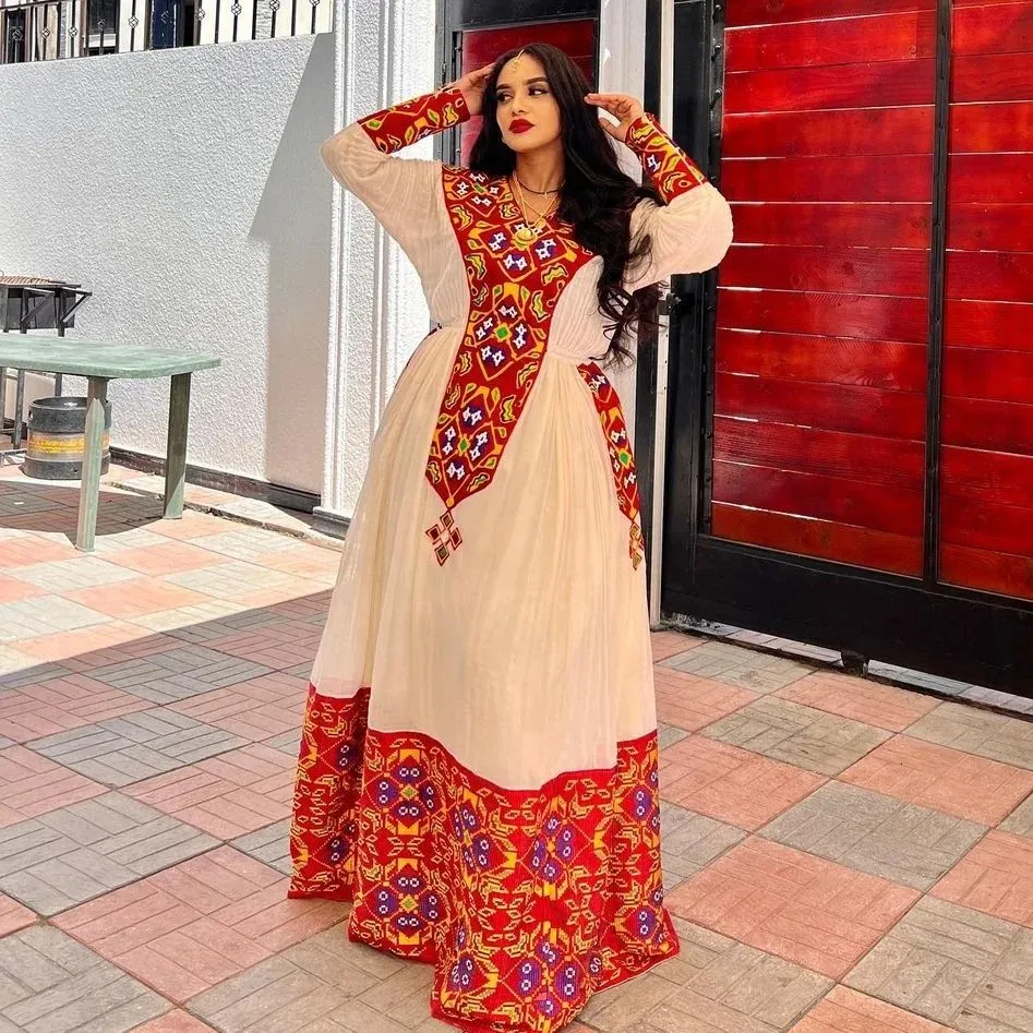 Vibrant Crimson Menen Marvel: Contemporary Handwoven Ethiopian Kemis
