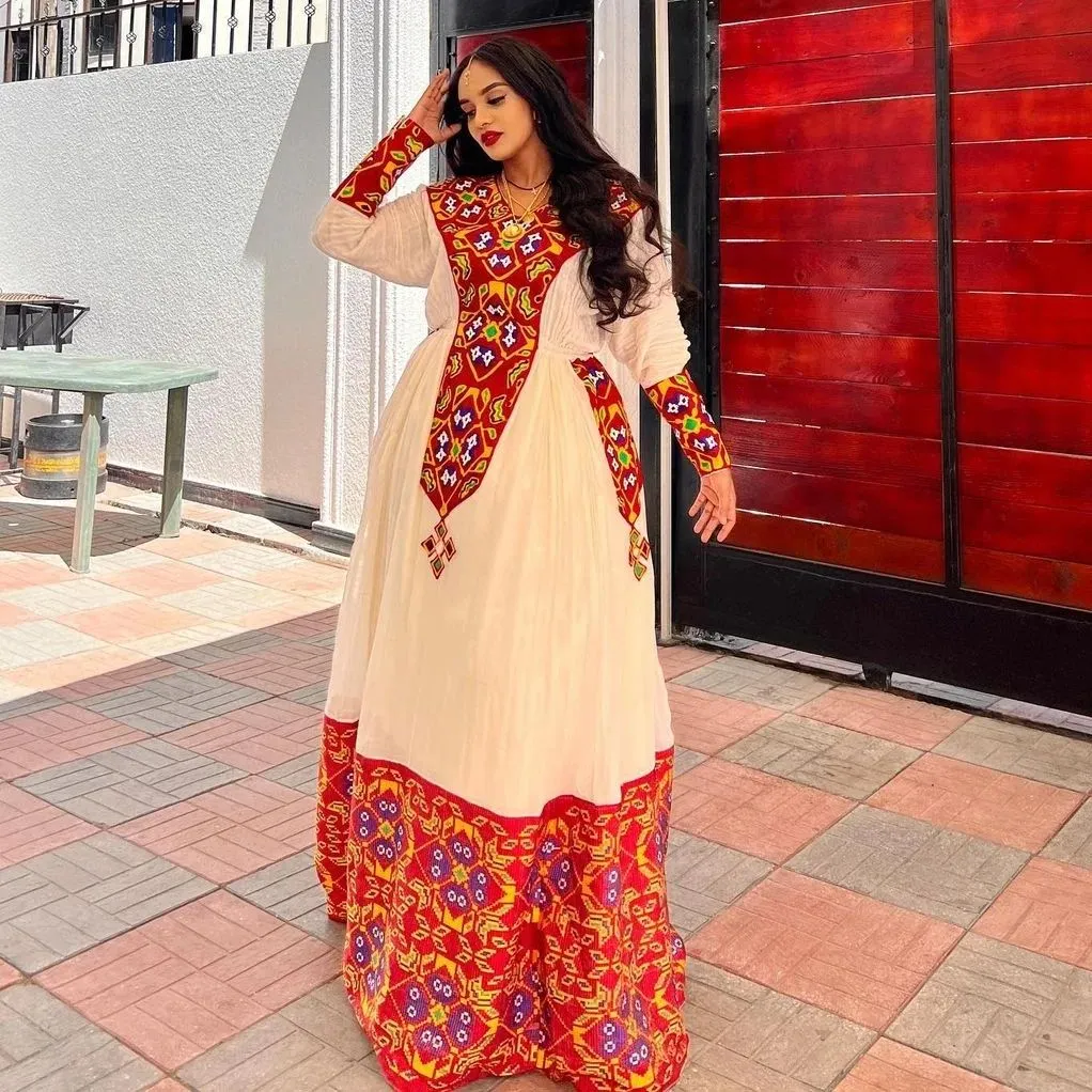 Vibrant Crimson Menen Marvel: Contemporary Handwoven Ethiopian Kemis